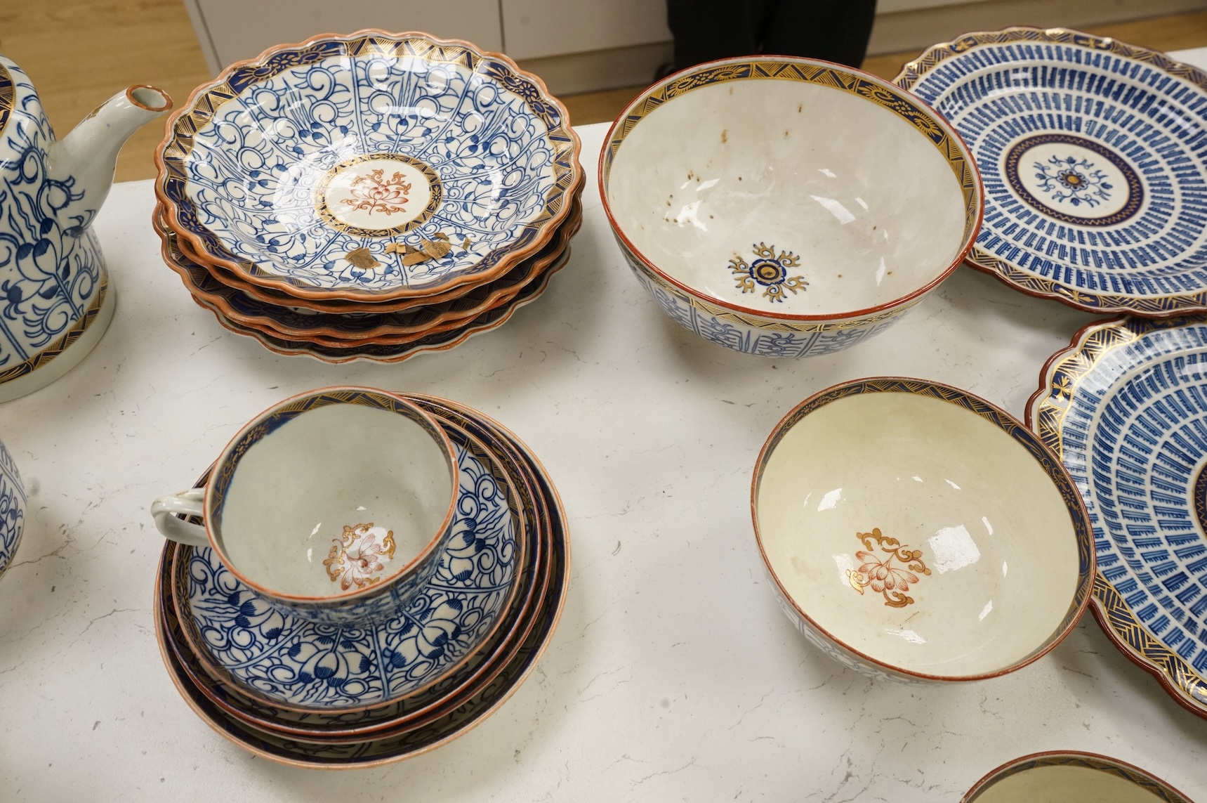 A collection of Worcester Royal Lily pattern tea, coffee and dessert wares and two similar dishes, late 18th/early 19th century